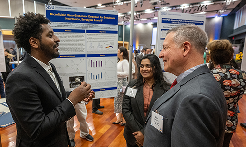 Celebration of Research photo of student poster.